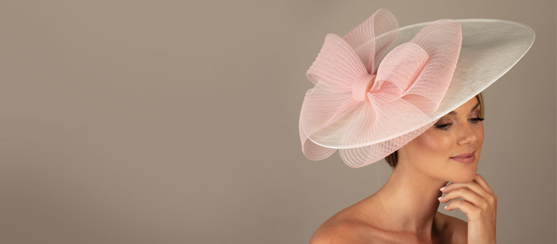 coral coloured wedding hats